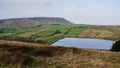 View of lower Black moss reservoir and Pendle hill.