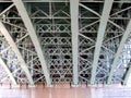 View of the lower metal structure of the bridge from the steamer deck, historical city center, Vltava panorama, sunny summer day