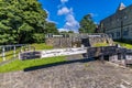 A view the lower of three locks gates on the Leeds, Liverpool canal at Bingley, Yorkshire, UK Royalty Free Stock Photo