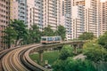 View of LRT train serving public residential housing apartments in Bukit Panjang.