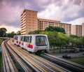 View of LRT train serving public residential housing apartments in Bukit Panjang. Royalty Free Stock Photo