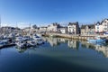 View of Lules Sandeau Quay and boats moored in the port of Le Pouliguen Channel in La Baule, the seaside resort in Southern