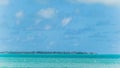 View from Luquillo beach in tropical Puerto Rico and white puffy clouds