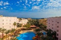 View of luxurious hotel with a swimming pool and Red sea Royalty Free Stock Photo