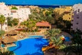 View of the luxurious hotel with swimming pool and Red sea Royalty Free Stock Photo