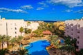 View of luxurious hotel with a swimming pool and Red sea Royalty Free Stock Photo