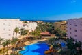 View of the luxurious hotel with swimming pool and Red sea Royalty Free Stock Photo