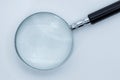View of magnifying glass, white background Royalty Free Stock Photo