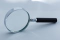 View of magnifying glass, white background Royalty Free Stock Photo