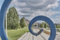 View of main alley of Millennium Park through a wrought iron gate element, Kazan, Russia