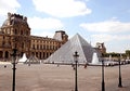 View of the main courtyard of the Louvre Palace with the glass a