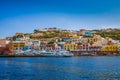 View of the Main Harbor and Port at Ponza, Italy. Boats at sea and houses on the mountainous coastline