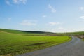 View of the main road leading to vineyards and farms in the Svatoborice region of Moravian Tuscany during a sunny autumn day in