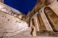 View of main staircase of Palace of the Popes at night in Avignon city