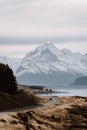 View of the majestic Aoraki Mount Cook with the road leading to Mount Cook Village. Taken during winter in New Zealand. Royalty Free Stock Photo