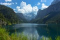 View of majestic mountains and lake.Nature getaway. Turquoise water of Gosau See,lake,Austria,Dachstein glacier in background. Royalty Free Stock Photo