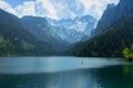 View of majestic mountains and lake.Nature getaway.Turquoise water of Gosau See,lake,Austria,Dachstein glacier in background. Royalty Free Stock Photo