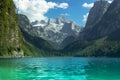 View of majestic mountains and lake.Nature getaway. Turquoise water of Gosau See,lake,Austria,Dachstein glacier in background. Royalty Free Stock Photo