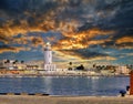 View of the Malaga lighthouse with a spectacular sunset Royalty Free Stock Photo