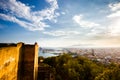 View of Malaga port, Cathedral. Alcazaba and cityscape. Tourists othe wall of Castillo de Gibralfaro