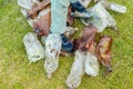 View of male feet trampling a bunch of plastic bottles/Concept ecology. View of male feet trampling a bunch of plastic bottles