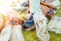 View of male feet trampling a bunch of plastic bottles/Concept ecology. View of male feet trampling a bunch of plastic bottles