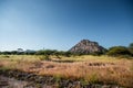 A view of the male hill at Tsodilo Hills, a UNESCO world heritage site featuring ancient San rock paintings. Pictured amid grassy