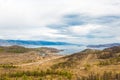 View of the Maloe More Strait, Curkut Bay and tourist centers on the shore. September. Lake Baikal, Russia. Royalty Free Stock Photo