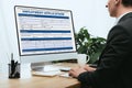 View of man filling in Vaccination Documentation, Medical Concept Royalty Free Stock Photo