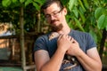 View on a man holding a baby turkey in his hands