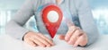 Man holding a 3d rendering pin holder on a globe with coordinate Royalty Free Stock Photo