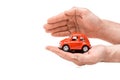 View of man holding red toy car isolated on white Royalty Free Stock Photo