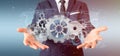 Man holding a technology gear wheel interface3d rendering Royalty Free Stock Photo