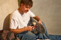 View of a man repairing his skateboard in the skate park. Extreme sport concept Royalty Free Stock Photo