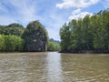 View of mangrove forest and limestone hills from boat cruise in Kilim Karst Geoforest Park, Langkawi, Kedah, Malaysia. Royalty Free Stock Photo