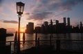 View of Manhattan from the Brooklyn Bridge at sunset, New York City, New York Royalty Free Stock Photo