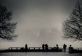 View of Manhattan, New York, from Liberty Island in a foggy day. Royalty Free Stock Photo