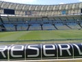 View of the MaracanÃ£ football stadium behind the players\' dugout Royalty Free Stock Photo