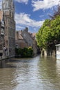 View from Mary\'s Bridge of Rosary Quay (Rozenhoedkaai) by the water channel Dijver Canal, Bruges, Belgium Royalty Free Stock Photo