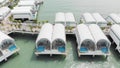 View of a marina with waterfront resort bungalows on a peaceful lake