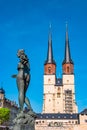 View of Market Church of Our Dear Lady or Marktkirche Unser Lieben Frauen and Gobel Fountain in Halle (Saale), Germany Royalty Free Stock Photo