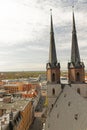 view from the market church twin towers over Halle architectural contrast between the old church and the modern MDR building