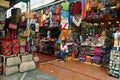 View of a market stall with incan handicraft and peruvian souvenirs