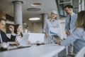 Mature business woman explaining project details on a meeting in office Royalty Free Stock Photo