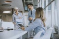 Mature business woman explaining project details on a meeting in office Royalty Free Stock Photo