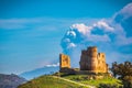 View of Mazzarino Medieval Castle with the Mount Etna in the Background during the Eruption, Caltanissetta, Sicily Royalty Free Stock Photo
