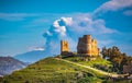 View of Mazzarino Medieval Castle with the Mount Etna in the Background during the Eruption, Caltanissetta, Sicily Royalty Free Stock Photo