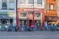 View of McDonald`s in retro building on the Muntplein street Royalty Free Stock Photo