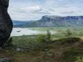 View on meandering glacial Rapadalen river delta valley at Sarek national park, Sweden Lapland with big rock, mountains