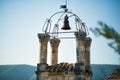 View of medieval bell and clock tower in the old town of the picturesque medieval village Lacoste, Vaucluse, Provence, France, one